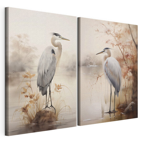 Two birds standing on a rock in water