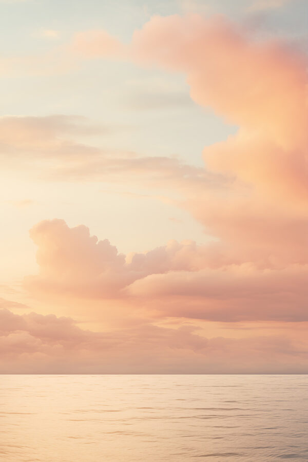 Body of water with clouds in the sky